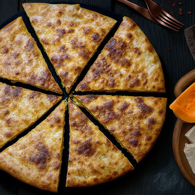 Пирог с сыром и тыквой стандартный в Грузинский дворик по цене 530 ₽