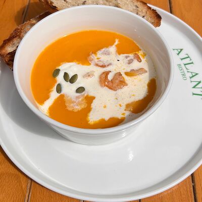 Тыквенный крем-суп с креветкой в Atlant bistro по цене 550 ₽