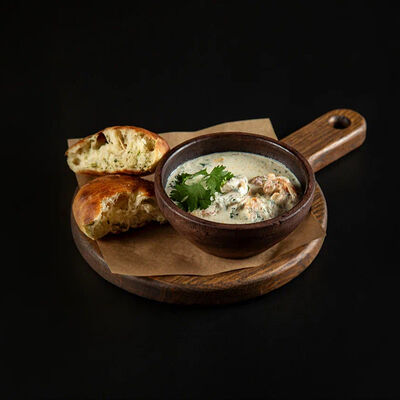 Креветки в соусе чкмерули с зеленой аджикой в Mimi по цене 1128 ₽