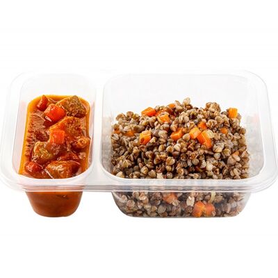 Гуляш со свининой с гарниром из гречкив Arabix по цене 360 ₽