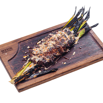 Стейк рибай с запеченным в углях луком-пореем в ИТЛЕ Стейк-кафе Halal по цене 2570 ₽