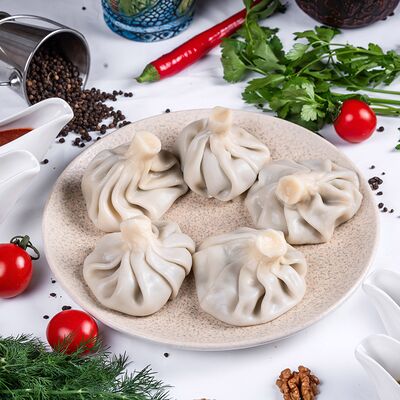 Хинкали с семгой в Тамада по цене 800 ₽