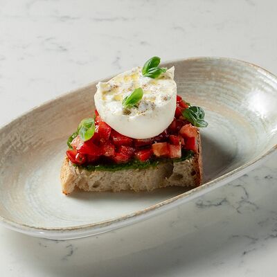 Брускетта с бурратой в Cheeseria по цене 550 ₽