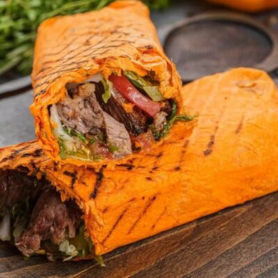 Шаурма куриная в сырном лаваше в Донер&Кебаб по цене 420 ₽