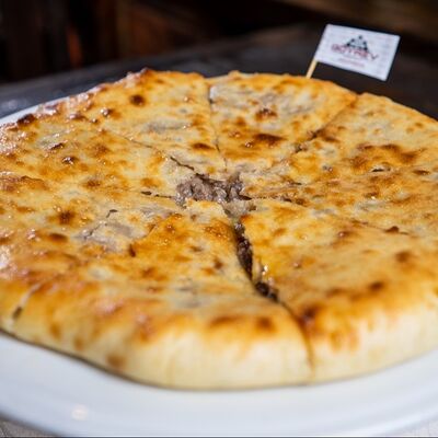 Пирог с мясом Фыдджын маленький в Шафран по цене 745 ₽