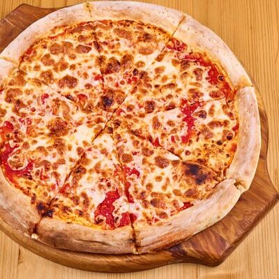 Пицца Маргарита в 4 сыра по цене 690 ₽