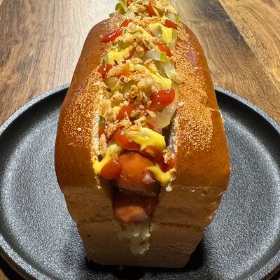 Фирменный двойной хот-дог в Ragnar bar по цене 565 ₽