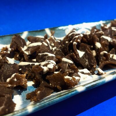 Вяленая вырезка теленка в Magnum bar по цене 880 ₽