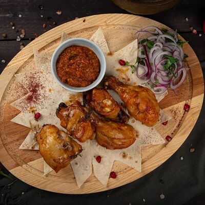 Шашлык из куриного бедра без костей в Мангал Хаус по цене 570 ₽