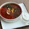 Солянка мясная с чесночной сметаной и оливками в Penates по цене 450