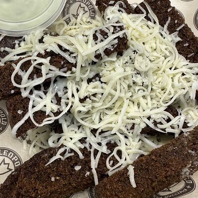 Гренки с чесноком и сыром в Леопольд по цене 395 ₽