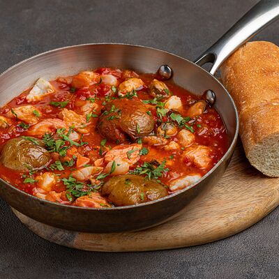 Чоппино — рыбное рагу в томатном соусе в МОСТ бистро по цене 1750 ₽