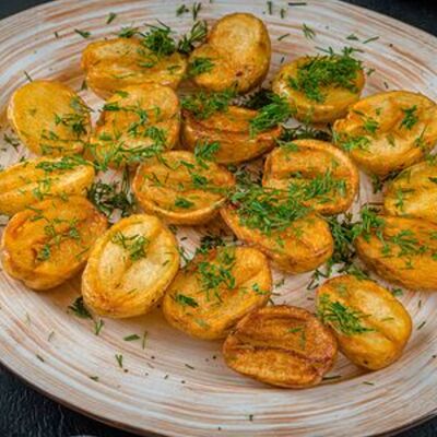 Картофель молодой с зеленью в Ресторан Воробьёвы Горы PREMIUM по цене 449 ₽