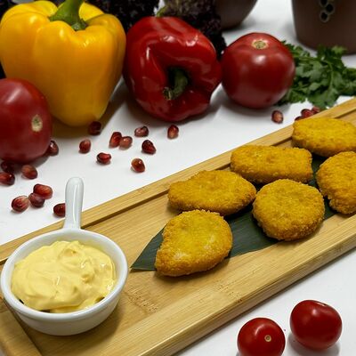 Наггетсы куриные и сырный соус в Хачапуридзе по цене 360 ₽