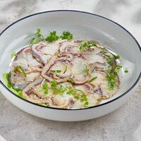 Карпаччо из осьминога в True Crab