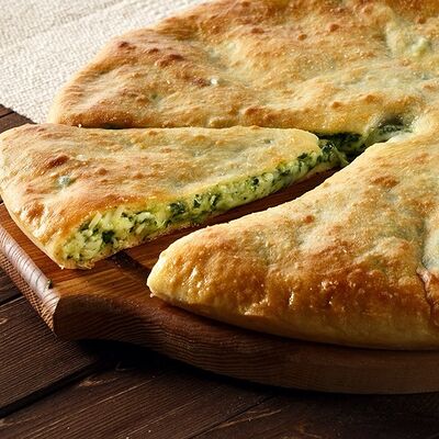 Хачапури с сыром и зеленью в Каретный дворик по цене 680 ₽