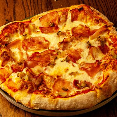 Пицца Мясная в Горки парк по цене 830 ₽