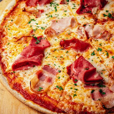 Пицца Мясная 33см в Bourbon по цене 670 ₽