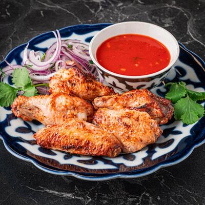 Куриные крылышкив Чайхана Плов центр по цене 310 ₽