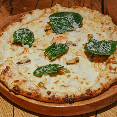 Пицца «Фила» с морепродуктами 22 см в Rekki Pizza & Cocktail Bar по цене 1490 ₽