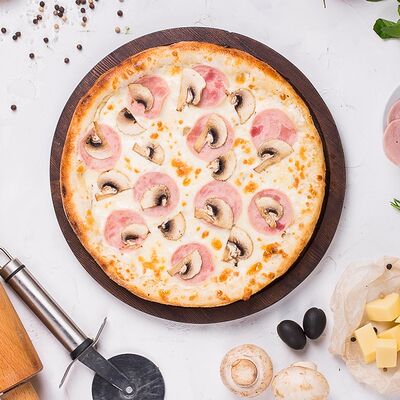 Ветчина и грибы 30 см в Pizza Sun по цене 749 ₽