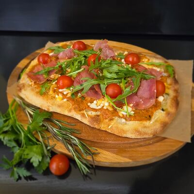 Пицца Римская с пармской ветчиной в Трасса по цене 999 ₽