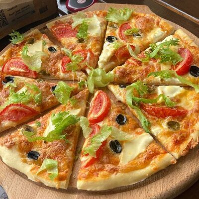 Пицца Греческаяв Баррель по цене 588 ₽