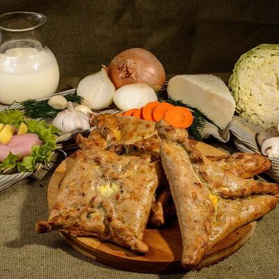 Чукуры с куриной грудкой и картошкой в Пироги по-коми по цене 1268 ₽