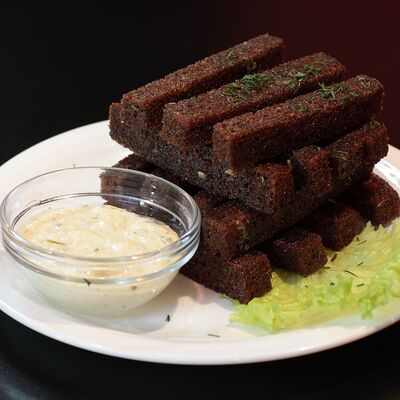 Чесночные гренки в Пельмэн по цене 205 ₽