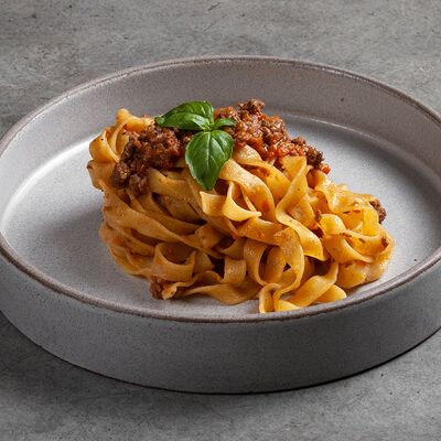 Паста тальятелле Болоньезе в Penny по цене 590 ₽