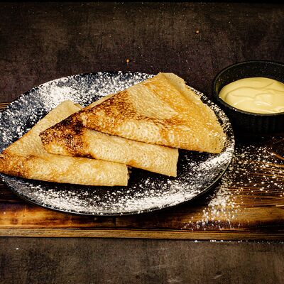 Блинчики со сгущенным молоком в У Сватов по цене 290 ₽