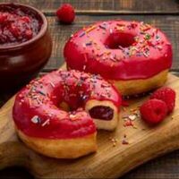 Донат с малиновой начинкой в Bob Coffee