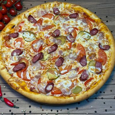 Пицца Охотничьяв Шашлык тандыр по цене 750 ₽