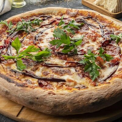 Пицца Мясная Халяль в IKRA по цене 570 ₽