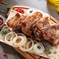 Шашлык из свиных ребер на углях в Форель