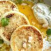 Сырники кокосовые с апельсиновым соусом в Молоко по цене 480
