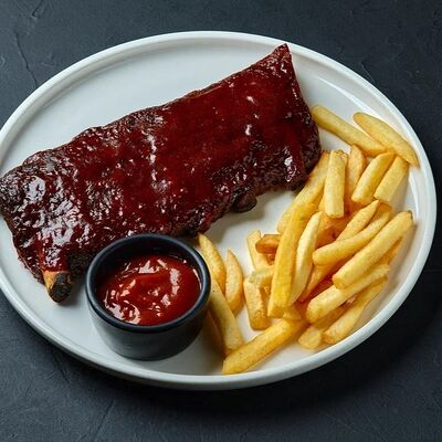 Ребра свиные BBQ в Mesto Sushi & Grill по цене 890 ₽