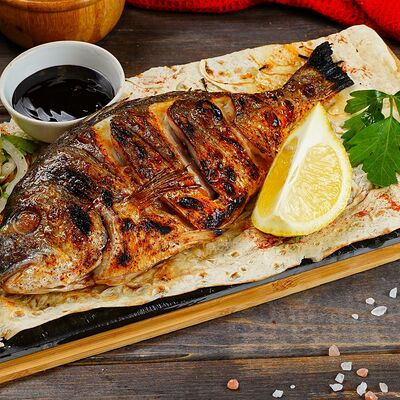 Дорадо на мангале в Щербет по цене 1538 ₽