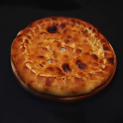 Осетинский пирог с куриным филе в Ирбис по цене 490