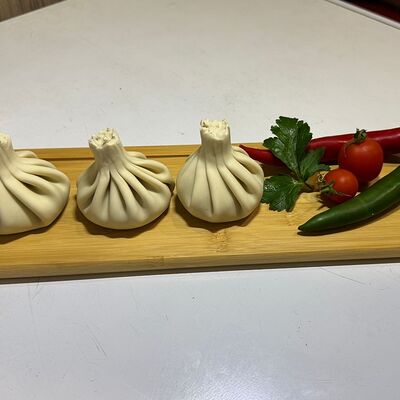 Хинкали с говядиной и свининой в Гостиный дворик по цене 330 ₽