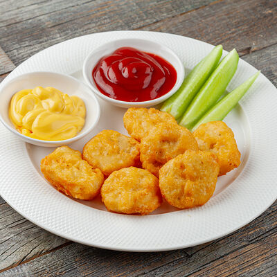 Наггетсы с соусом и огурцом в Трапезная по цене 350 ₽