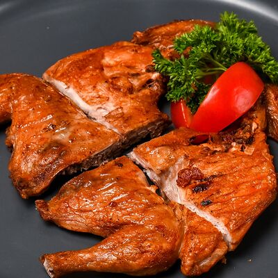 Цыпленок табака с соусом Ткемали в Keto & Kote Грузинская кухня по цене 821 ₽