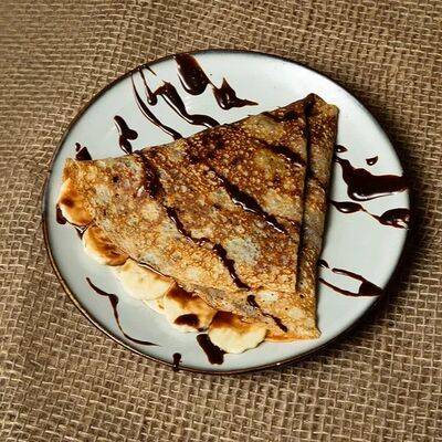 Блин с Бананом и пастой Nutellа в ПЕЛЬМЕНИН по цене 320 ₽