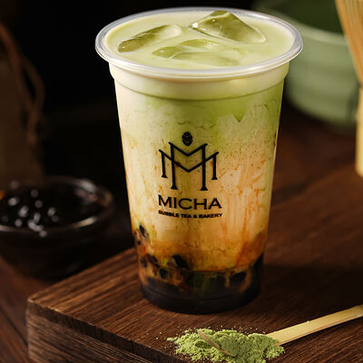 Чай с молоком и матча с карамельной тапиокой в Micha Bubble Tea & Bakery по цене 539 ₽