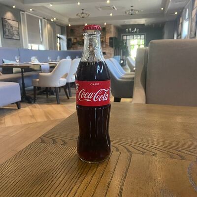 Coca-Cola в Мада по цене 180 ₽