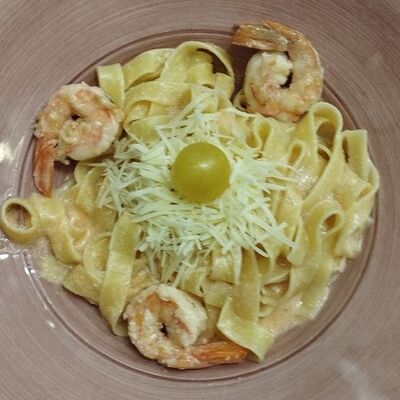 Феттуччине с тигровыми креветками в Oscar по цене 690 ₽