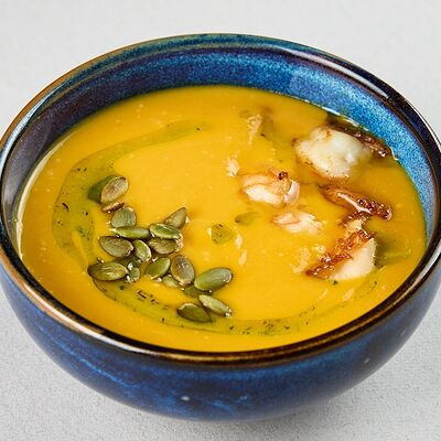 Тыквенный крем-суп с креветками на кокосовом молоке в Василек по цене 550 ₽