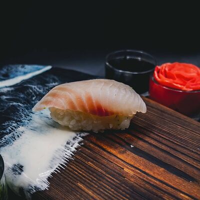 Суши с окунем в Sushi Time по цене 85 ₽
