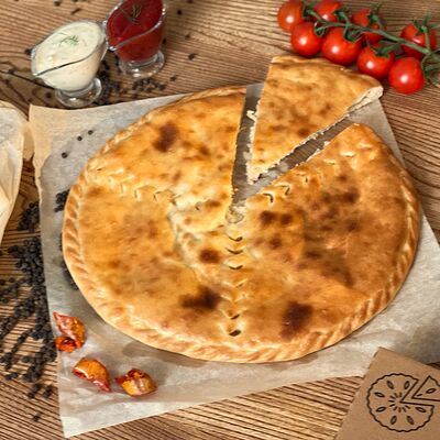 Пирог с курицей и сыром в Ирбис по цене 500