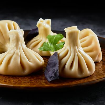 Хинкали со шпинатом и сыром в Грузинскоебистро Каха по цене 184 ₽